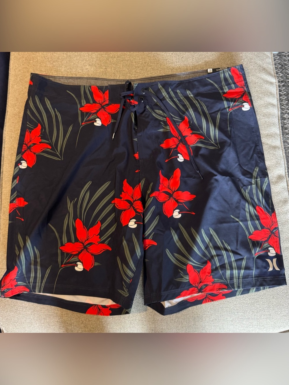 Hurley Men's Size 38 Black Floral Tropical Swim Trunks with Red Hibiscus Print